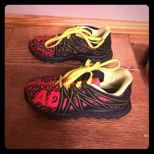 A pair of almost brand new  Adidas kids shoes.